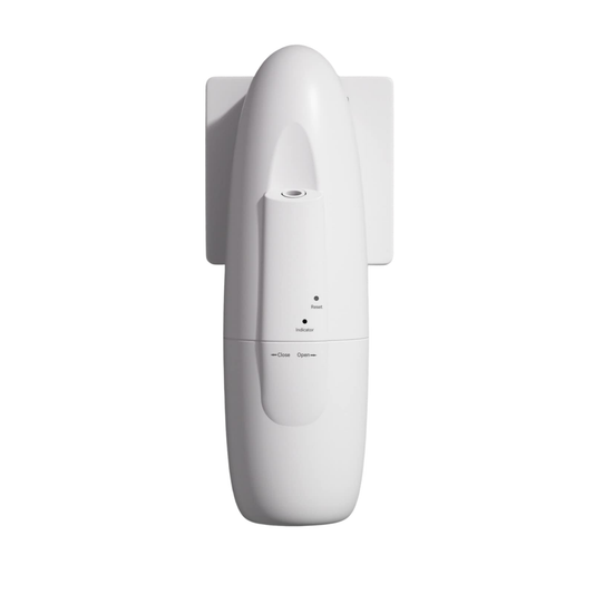 White wall-mounted air freshener on a white background